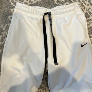 Newish comfy nike white sweatpants with zipper on leg only worn 1 time